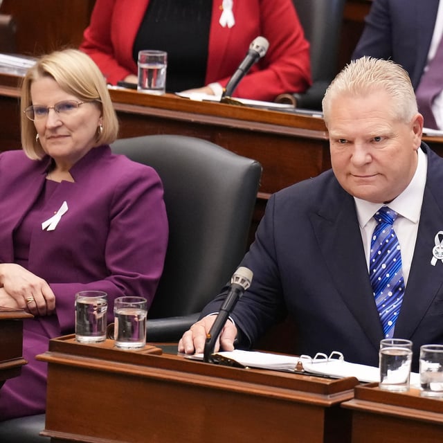 Ontario Premier Doug Ford, right, and Ontario Health Minister Sylvia Jones listen to questions from the opposition during question period at Queen's Park in Toronto on December 6, 2023. THE CANADIAN PRESS/Nathan Denette
