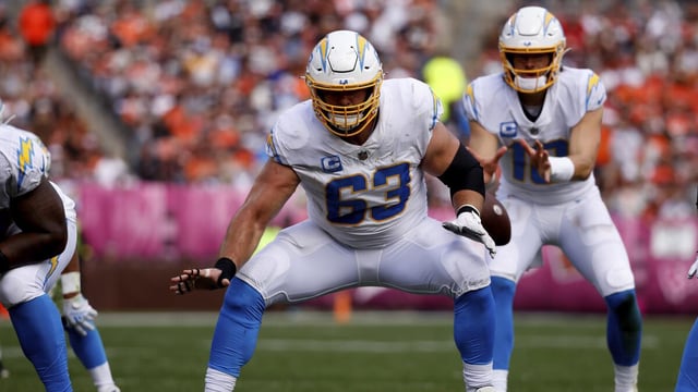  Chargers center Corey Linsley (63) looks to make a block in front of quarterback Justin Herbert.