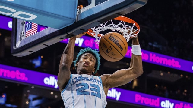 FILE - Charlotte Hornets forward Kai Jones dunks during the first half of an NBA basketball game against the Orlando Magic, March 3, 2023, in Charlotte, N.C. The Hornets announced Saturday, Sept. 30, 2023, that 2021 first-round draft pick Jones will not participate in training camp due to personal reasons. (AP Photo/Scott Kinser, File)