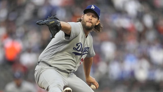 Los Angeles Dodgers pitcher Clayton Kershaw works against the San Francisco Giants.