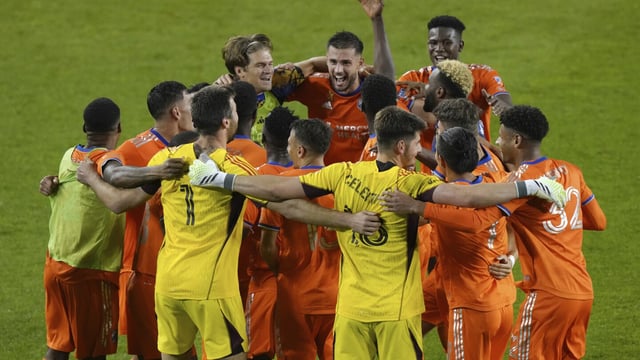 FC Cincinnati players celebrate a win over Toronto FC in an MLS soccer match Saturday, Sept. 30, 2023, in Toronto. (Chris Young/The Canadian Press via AP)