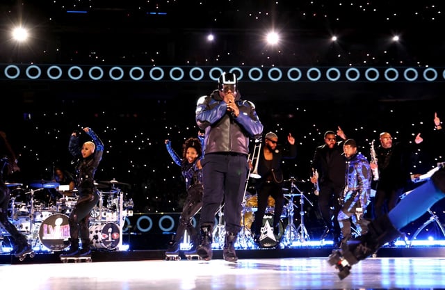 Will.i.am performs onstage during the Apple Music Super Bowl LVIII Halftime Show at Allegiant Stadium.