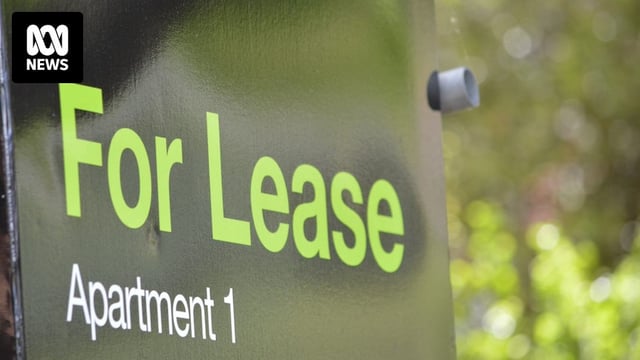 A black sign with green letters reading "For Lease, Apartment 1".