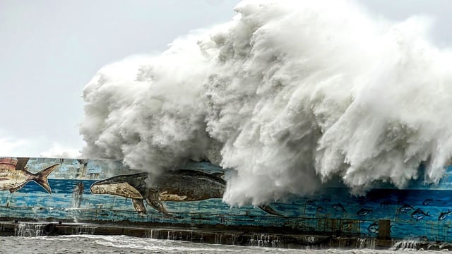 Giant waves crashing over a sea wall as Typhoon Kong-rey neared the coast in Taitung, Taiwan on October 31, 2024.