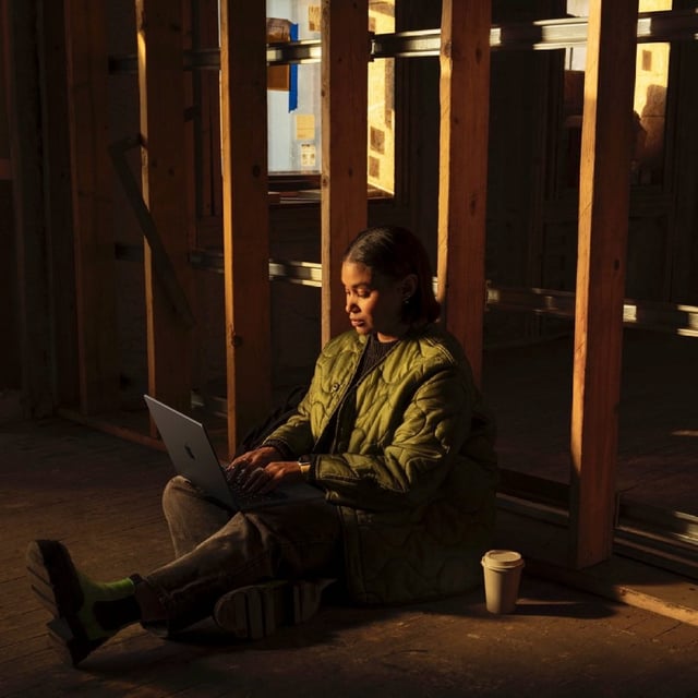A person using the M4 MacBook Pro.