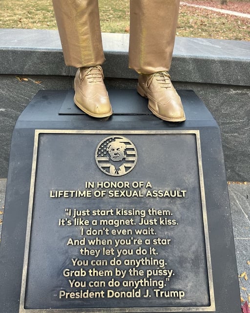 The plaque on the statue in Philadelphia.