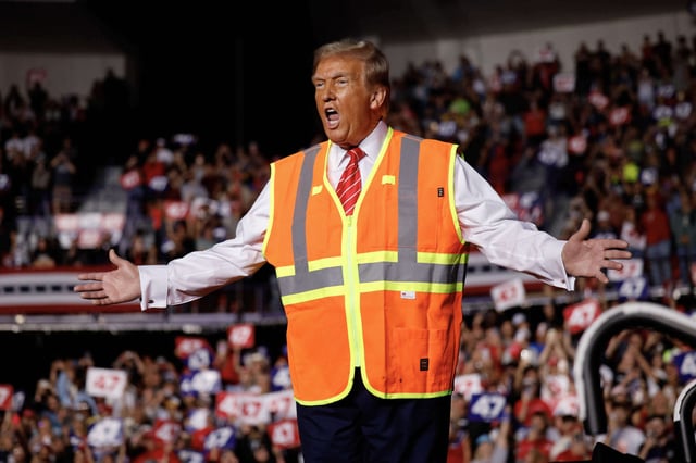 Republican presidential nominee, former President Donald Trump greets supporters during a campaign event at the Resch Center on October 30, 2024, in Green Bay, Wisconsin.