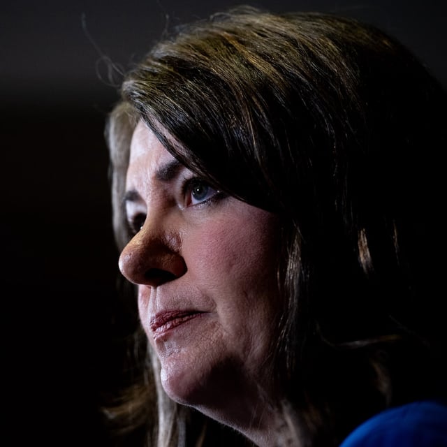 Alberta Premier Danielle Smith speaks to reporters on the sidelines of the Canada Strong and Free Network event in Ottawa, on Friday, April 12, 2024. Alberta's government has launched a national ad campaign targeting the federal government's incoming emissions cap for the oil and gas sector. THE CANADIAN PRESS/Spencer Colby