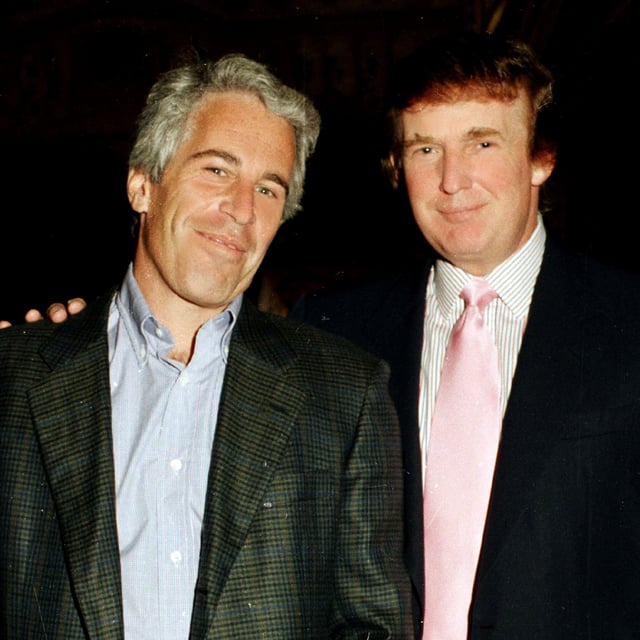 Jeffrey Epstein (left) and real estate developer Donald Trump as they pose together at the Mar-a-Lago estate, Palm Beach, Florida, 1997. Author Michael Wolf discussed Trump's and Epstein's relationship on his podcast.
