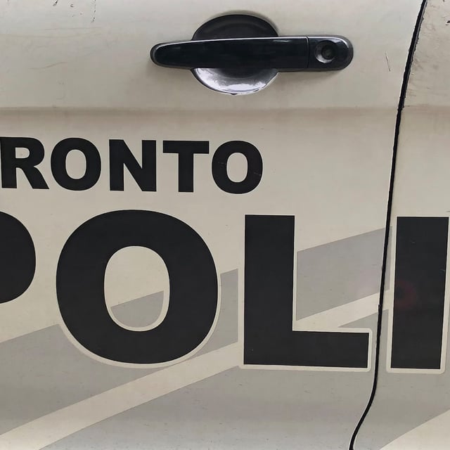 Toronto police say dozens of people have been arrested so far in an ongoing investigation into auto theft and fraudulent vehicle identification numbers.Toronto Police lettering is shown on the side of a police vehicle in Toronto on August 2, 2023. THE CANADIAN PRESS/Richard Buchan