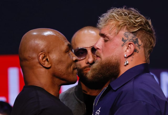 Mike Tyson and Jake Paul face off during a press conference at the Apollo Theatre in New York, on May 13.