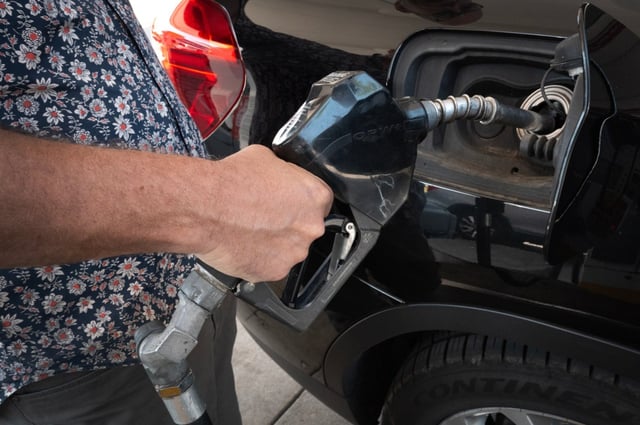 A customer purchases gas at a station on June 11, 2024 in Chicago, Illinois. (Photo by Scott Olson/Getty Images)