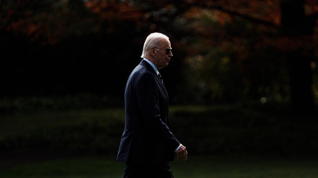 U.S. President Joe Biden walks across the South Lawn of the White House while returning from a weekend trip to Wilmington, Delaware, in Washington, U.S., November 4, 2024. REUTERS/Nathan Howard