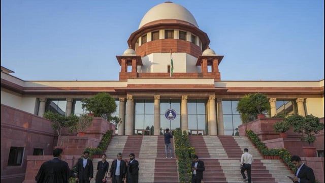 Lawyers at the Supreme Court complex in New Delhi. (PTI Photo)