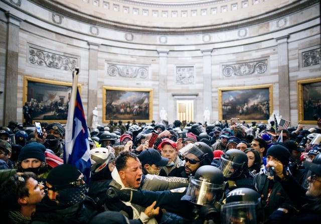 Police clash with supporters of then-US President Donald Trump who stormed the Capitol building  in Washington D.C. on Jan. 6, 2021. 