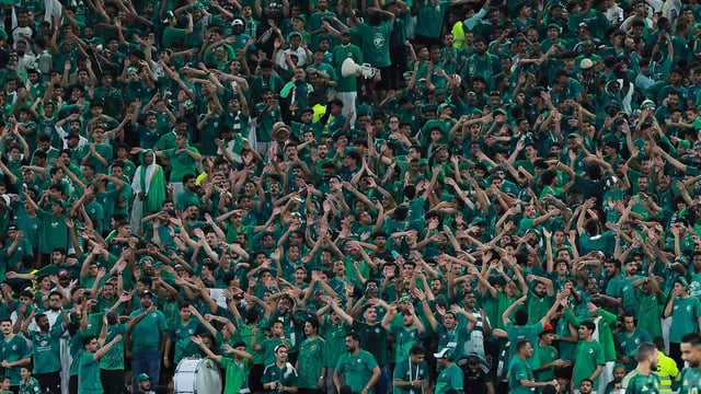 Saudi Arabia fans during a football match.