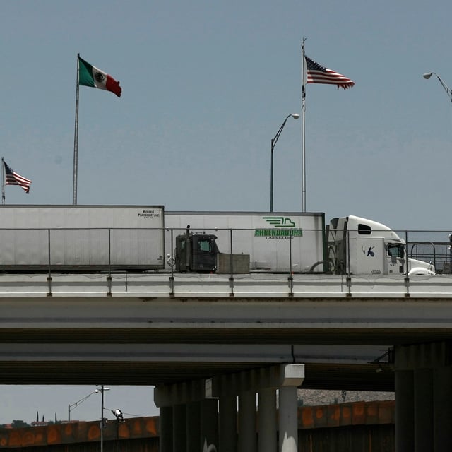 Semi-trailers idle in line on the Córdova-Américas International Bridge as seen from Ciudad Juarez, Mexico, Friday, June 7, 2019. Companies have been rushing to ship as many goods as possible out of Mexico to get ahead of possible tariffs threatened by President Donald Trump, hurriedly sending cars, appliances and construction materials across the border to beat Monday's deadline. (AP Photo/Christian Torres)