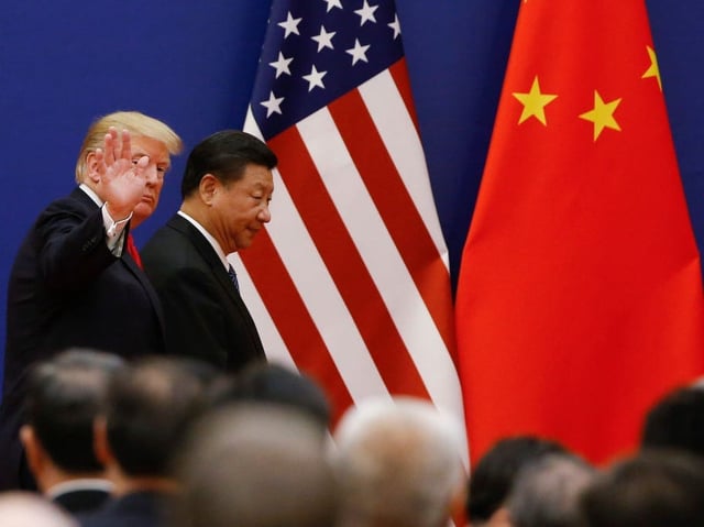 Donald Trump and Xi Jinping at a 2017 event in Beijing