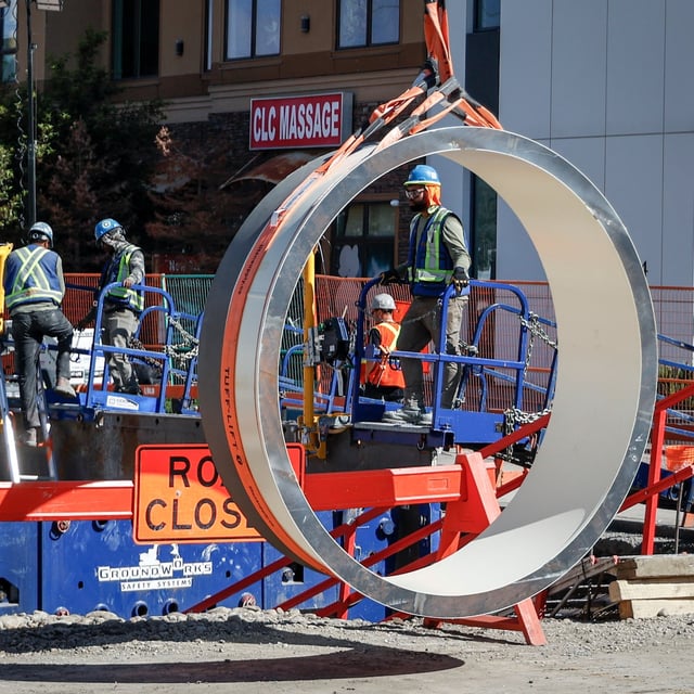 Crews continue to work to repair a major water main break and five other weak spots in Calgary on June 22, 2024. A preliminary report into the feeder main failure in Calgary that led to two rounds of water restrictions earlier this year has indicated that it wasn't caused by any one factor. THE CANADIAN PRESS/Jeff McIntosh