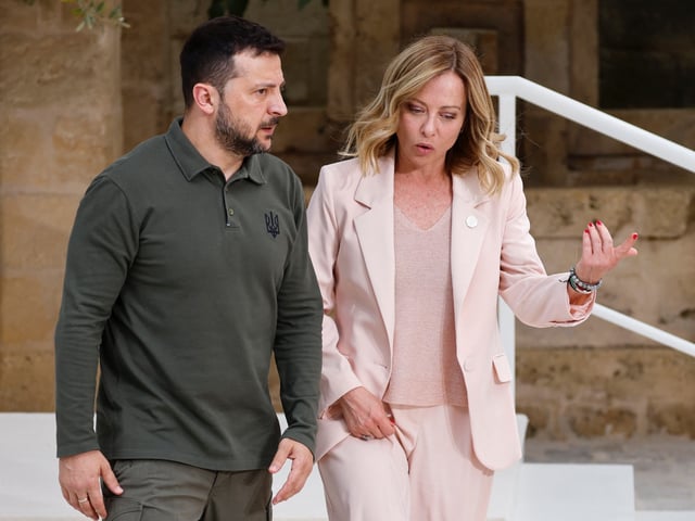 Ukraine's President Volodymyr Zelensky (L) is welcomed by Italy's Prime Minister Giorgia Meloni as he arrives at the Borgo Egnazia resort for the G7 Summit hosted by Italy in Apulia region, in Savelletri on June 13, 2024. Leaders of the G7 wealthy nations gather in southern Italy this week against the backdrop of global and political turmoil, with boosting support for Ukraine top of the agenda. (Photo by Ludovic MARIN / AFP) (Photo by LUDOVIC MARIN/AFP via Getty Images)