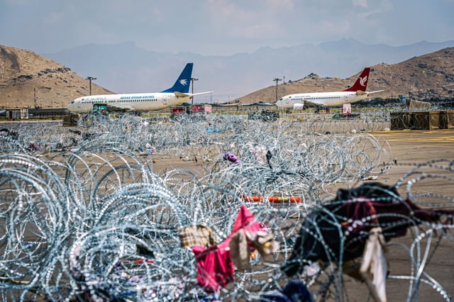 Barbwires lay across the tarmac, left behind after the U.S. Military has completely withdrawn from the country and Taliban fighters have moved in to take control of HKIA, in Kabul, Afghanistan, on Aug. 31, 2021.