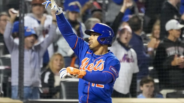 New York Mets' Francisco Lindor reacts at home plate after hitting a two-run home run during the fourth inning of the second game of a baseball doubleheader against the Philadelphia Phillies, Saturday, Sept. 30, 2023, in New York. (AP Photo/Mary Altaffer)