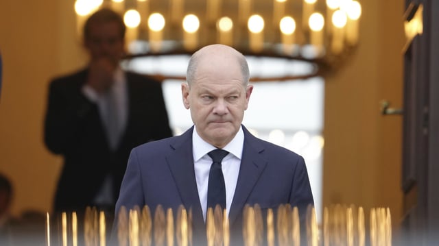 German Chancellor Olaf Scholz leaves Bellevue Palace, in Berlin, Germany, Nov. 7, 2024 (DPA photo by Kay Nietfeld via AP).
