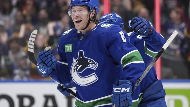 Vancouver Canucks' Brock Boeser celebrates a goal against the Edmonton Oilers during the second period of an NHL hockey game Wednesday, Oct. 11, 2023, in Vancouver, British Columbia. (Darryl Dyck/The Canadian Press via AP)