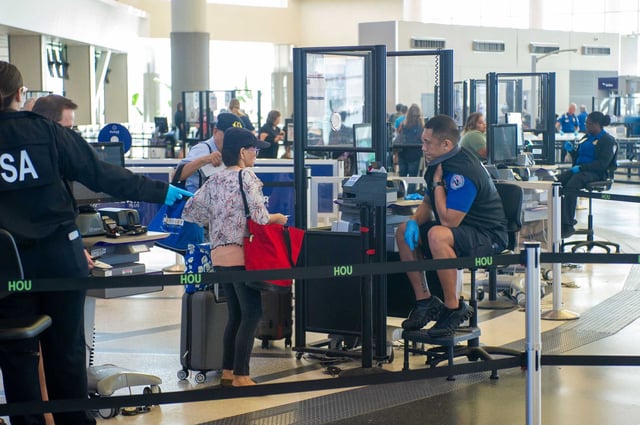 Passengers pass through a Transportation Security Administration checkpoint, Wednesday, Sep. 20, 2023 at Hobby Airport. For travelers who cook or just want to eat for Thanksgiving, some foods can be taken on flights as long as they meet guidelines, according to the Transportation Security Administration.