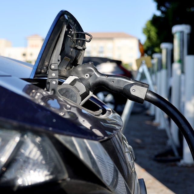 PASADENA, CALIFORNIA - SEPTEMBER 23: A Nissan LEAF electric vehicle (EV) recharges at a charging station on September 23, 2024 in Pasadena, California. The California Air Resources Board announced that California’s carbon dioxide emissions dropped 2.4 percent in 2022, even as the economy rebounded from the COVID-19 pandemic, primarily due to electric vehicle use and cleaner fuels. (Photo by Mario Tama/Getty Images)
