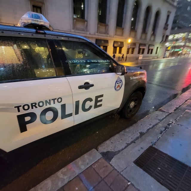 A Toronto police vehicle is shown parked in downtown Toronto on Tuesday, Jan. 3, 2023. Toronto police are probing a fatal collision that killed a 71-year-old man in the city's east end Thursday night. THE CANADIAN PRESS/Doug Ives
