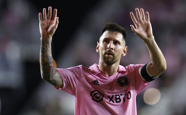 Lionel Messi #10 of Inter Miami CF waves to the fans after a draw during a match between Nashville SC and Inter Miami CF at DRV PNK Stadium on August 30, 2023 in Fort Lauderdale, Florida. (Photo by James Gilbert/Getty Images)
