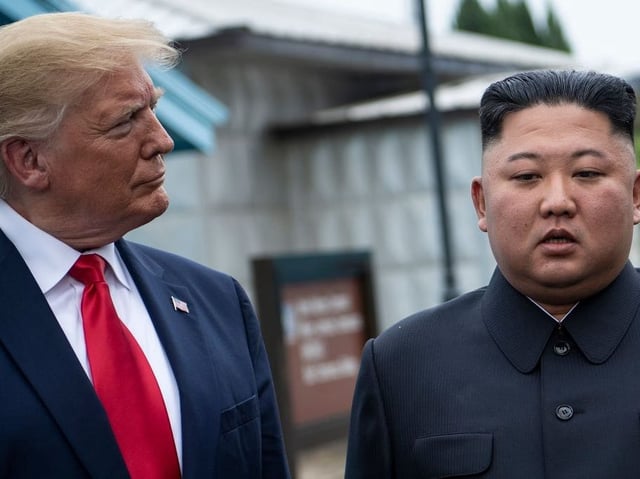 President Donald Trump and North Korea's leader Kim Jong Un talk before a meeting in the Demilitarized Zone (DMZ) in June, 2019, in Panmunjom, Korea.