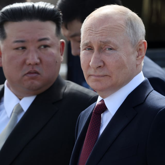 North Korean leader Kim Jong-un (L) and Russian President Vladimir Putin (R) visit a construction site of the Angara rocket launch complex on September 13, 2023 in Tsiolkovsky, Russia. "Dozens of high-resolution satellite images taken in recent months reveal that Russia has likely begun shipping North Korean munitions at scale," a new report from the London-based Royal United Services Institute (RUSI) think tank said on Monday.