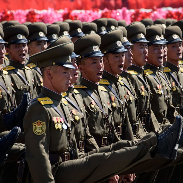 Korean People's Army (KPA) soldiers march during a mass rally on Kim Il Sung square in Pyongyang on September 9, 2018. North Korean troops deployed alongside Russian forces against Ukraine will be "cannon fodder," Ukrainian President Volodymyr Zelensky has said, confirming that the first of Pyongyang's fighters had been killed but stopping short of providing casualty numbers.