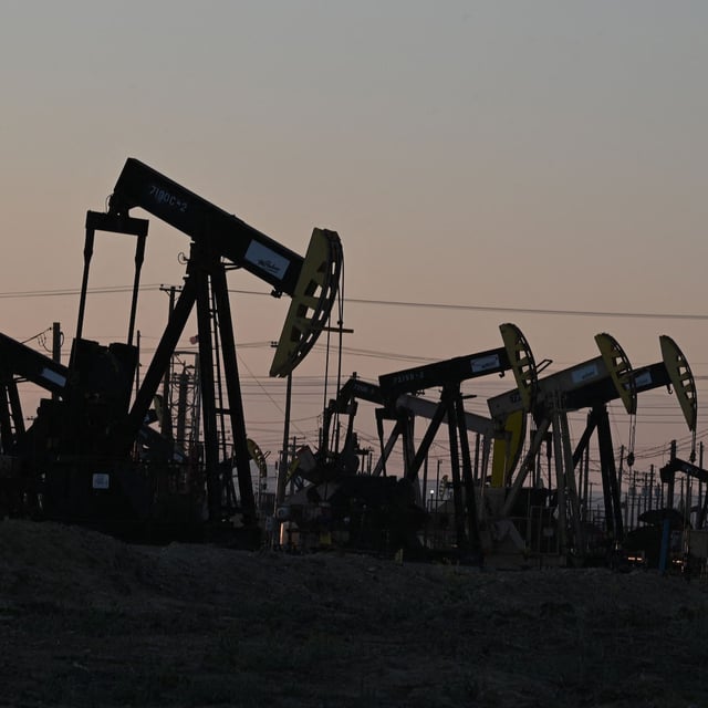 Active pump jacks increase pressure to draw oil toward the surface at the South Belridge Oil Field on February 26, 2022, in unincorporated Kern County, California, approximately 141 miles (227 km) northwest of Los Angeles, California. - From rural areas of the eastern states where modern oil production began to cities in southern California where pumpjacks loom not far from homes, lax regulations and the petroleum industrys boom and busts cycles have left the US pockmarked with perhaps hundreds of thousands of oil wells that are unsealed and haven't produced in decades. In a first, Washington is making a concerted effort to plug these wells by allocating $4.7 billion in federal infrastructure dollars to plug the wells in an effort to lessen the negative health and environmental impact of the disused wells. (Photo by Robyn BECK / AFP) (Photo by ROBYN BECK/AFP via Getty Images)