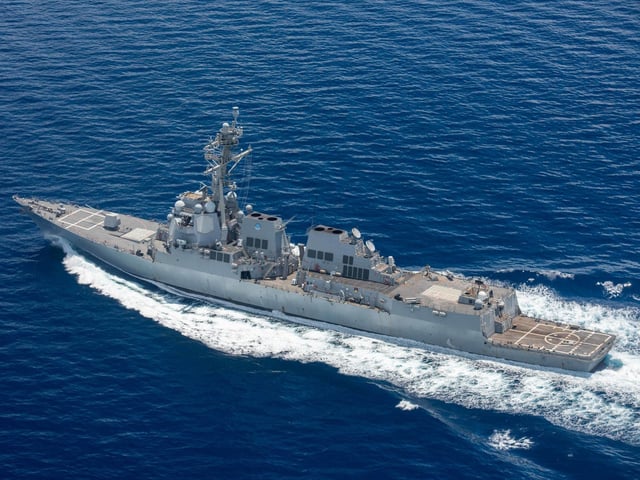The Arleigh Burke-class guided-missile destroyer USS Stockdale crosses from the South China Sea into the Philippine Sea in 2021.