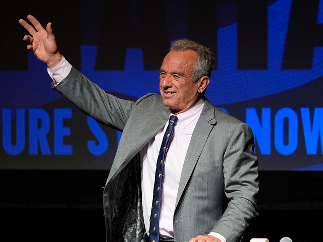 Independent presidential candidate Robert F. Kennedy Jr. waves to supporters during a campaign event, Saturday, April 13, 2024, in West Des Moines, Iowa. (AP Photo/Charlie Neibergall)