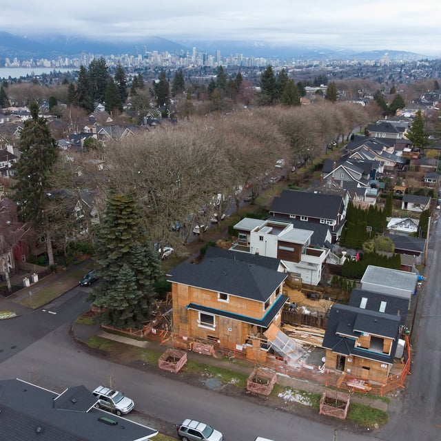 A house and a laneway home are seen under construction in Vancouver, on Friday, December 17, 2021. Darryl Dyck/The Globe and Mail