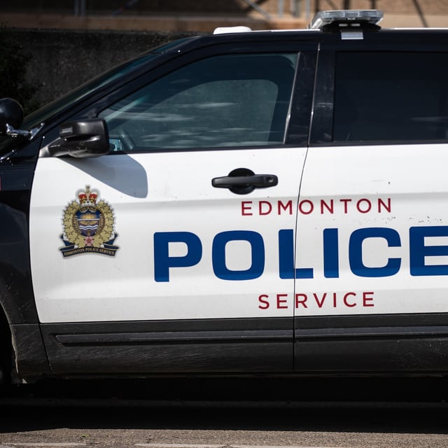 The head of Edmonton's police commission says he's stepping away from the job days after announcing he'd finish out his term while living abroad. Edmonton Police Service vehicle is shown in Edmonton on Tuesday Aug. 1, 2023. THE CANADIAN PRESS/Jason Franson.