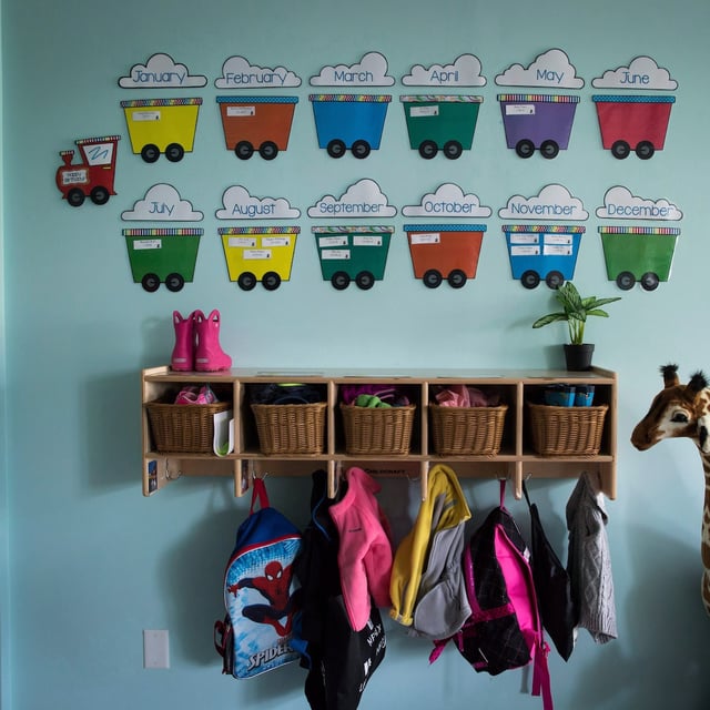 Children's backpacks and shoes are seen at a daycare franchise, in Langley, B.C., on May 29, 2018. Two months after Josclyn Johnson's 18-month-old daughter started daycare, it announced it was leaving the national $10-a-day program, which has left Johnson considering a line of credit to pay the new $2,310 monthly fee or leaving the workforce to care for her child. THE CANADIAN PRESS/Darryl Dyck