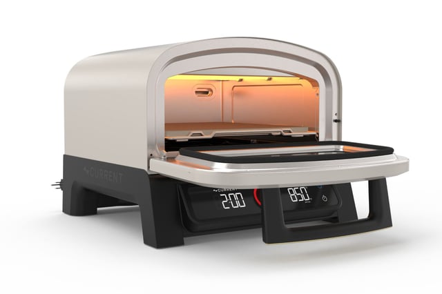 An image about Current Backyard Model P smart pizza oven cooks pizza in under 2 minutes, costs $599
