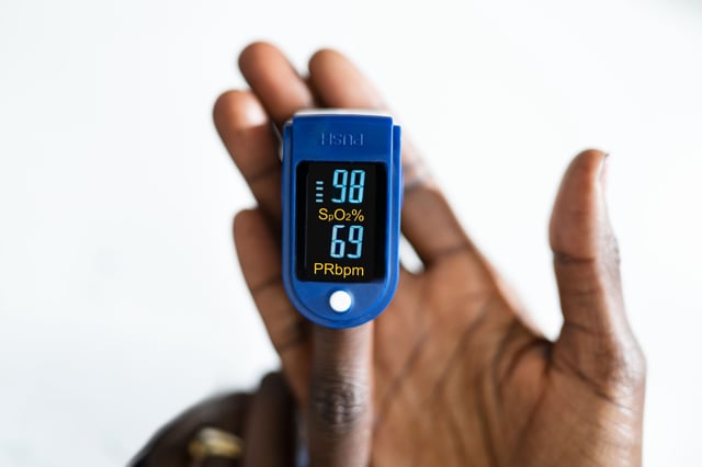 If pulse oximeters are not calibrated for darker skin tones, the pigmentation of the skin could affect how light is absorbed by the sensor, leading to erroneous oxygen readings.