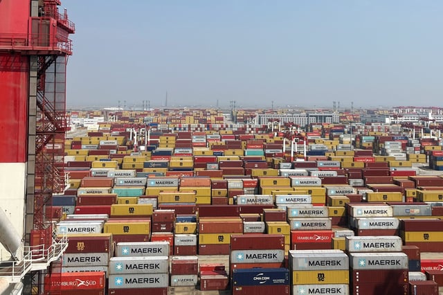 Containers sit at a terminal at the Yangshan deepwater port in Shanghai, China.