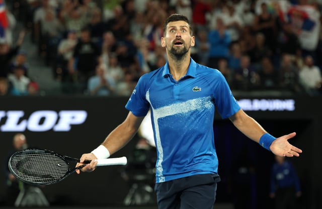Novak Djokovic celebrates winning the third set against Carlos Alcaraz during their Australian Open quarterfinal match at Melbourne Park.