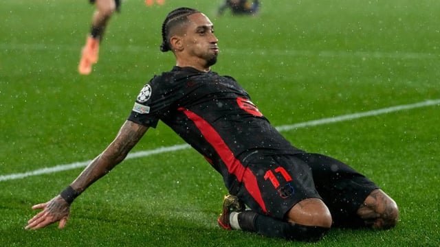 Raphinha celebrates his dramatic stoppage-time winner in Lisbon