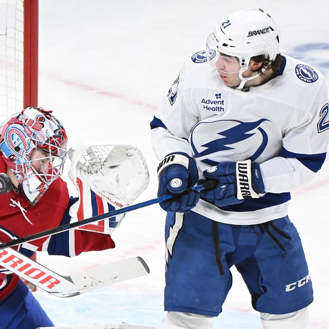 Tampa Bay Lightning's Brayden Point moves in on Montreal Canadiens goaltender Sam Montembeault during second period NHL hockey action in Montreal, Tuesday, January 21, 2025. THE CANADIAN PRESS/Graham Hughes