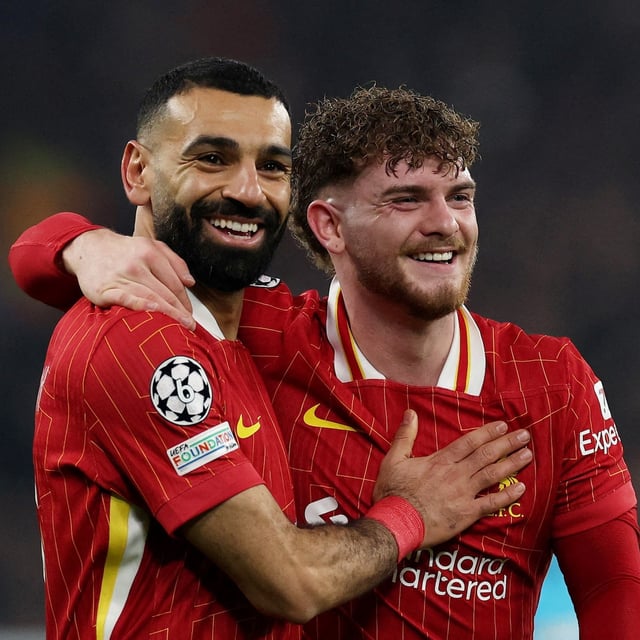 Soccer Football - Champions League - Liverpool v Lille - Anfield, Liverpool, Britain - January 21, 2025 Liverpool's Harvey Elliott celebrates with Mohamed Salah after scoring their second goal REUTERS/Phil Noble     TPX IMAGES OF THE DAY