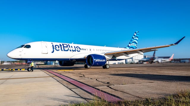 A JetBlue A220 taxiing.