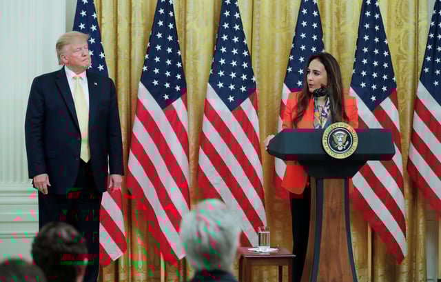 U.S. President Donald Trump listens as attorney Harmeet Dhillon addresses his social media summit with prominent conservative social media figures in the East Room of the White House in Washington, in Washington, U.S., July 11, 2019.